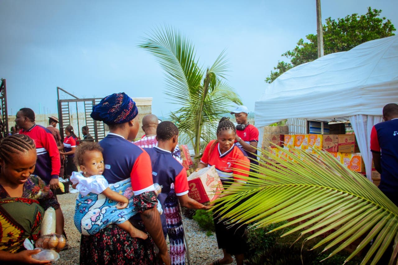 Families queuing to receive food parcels at the annual Christmas outreach